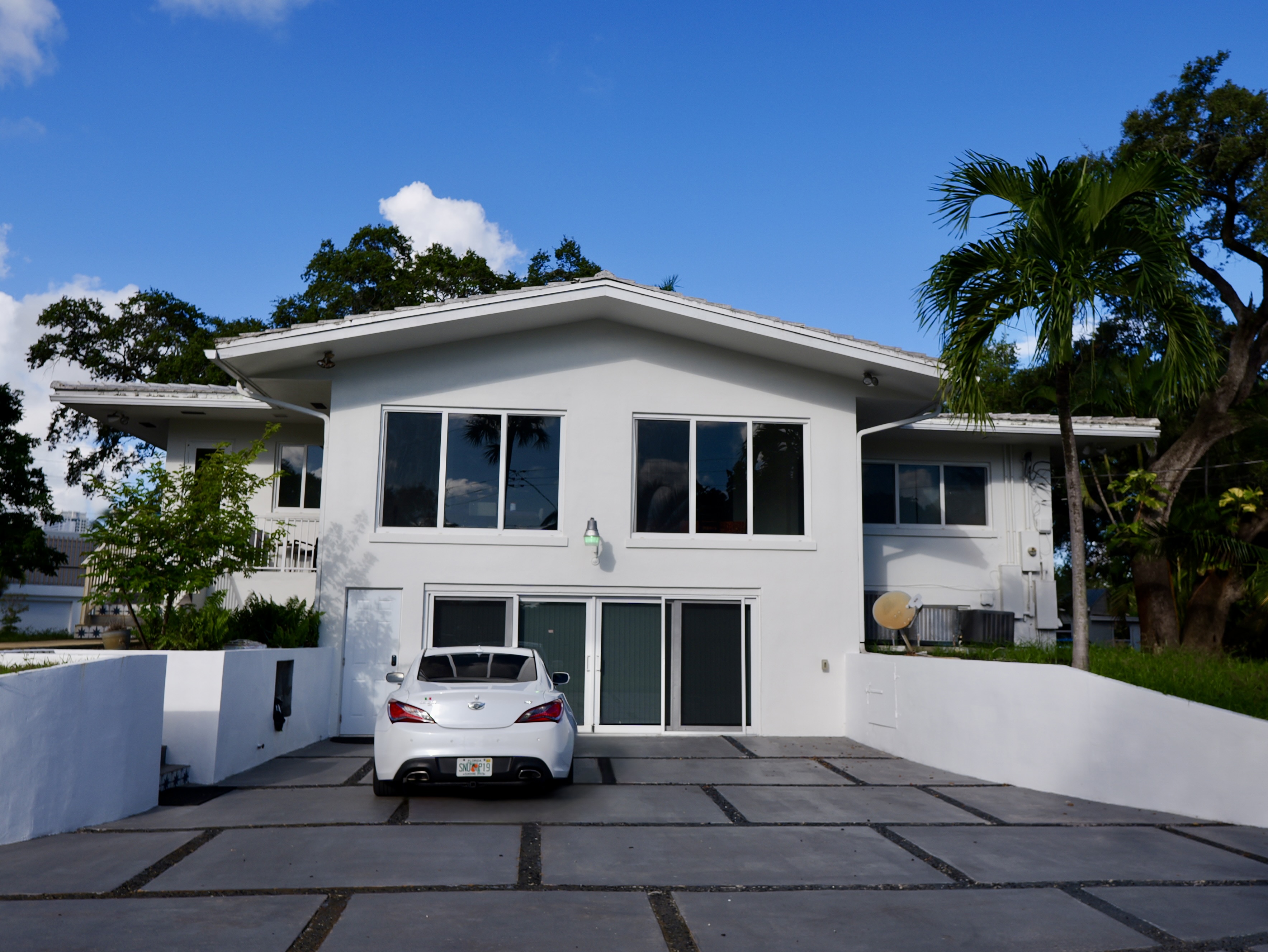 Completed white exterior residential paint project in South Florida